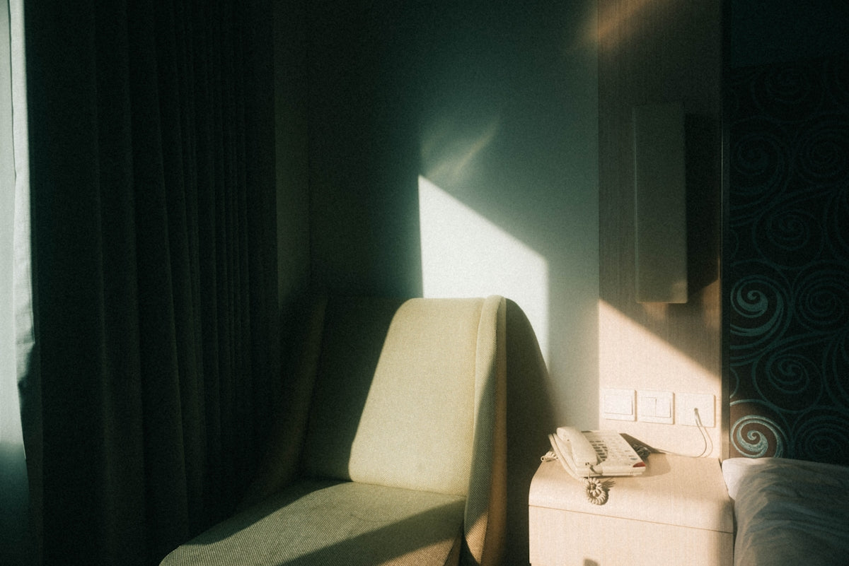 a bedroom with a large mirror